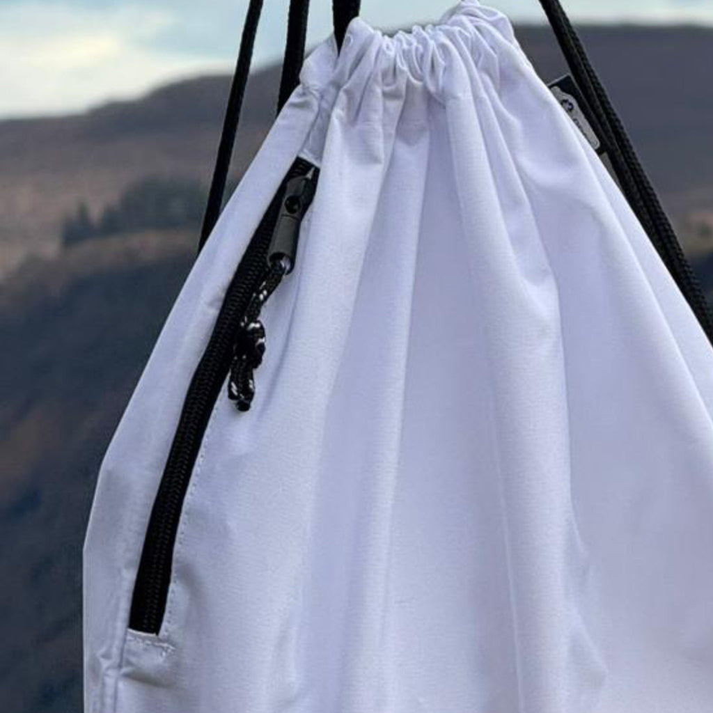 Rossi Athletics white drawstring gym bag zip pocket detail